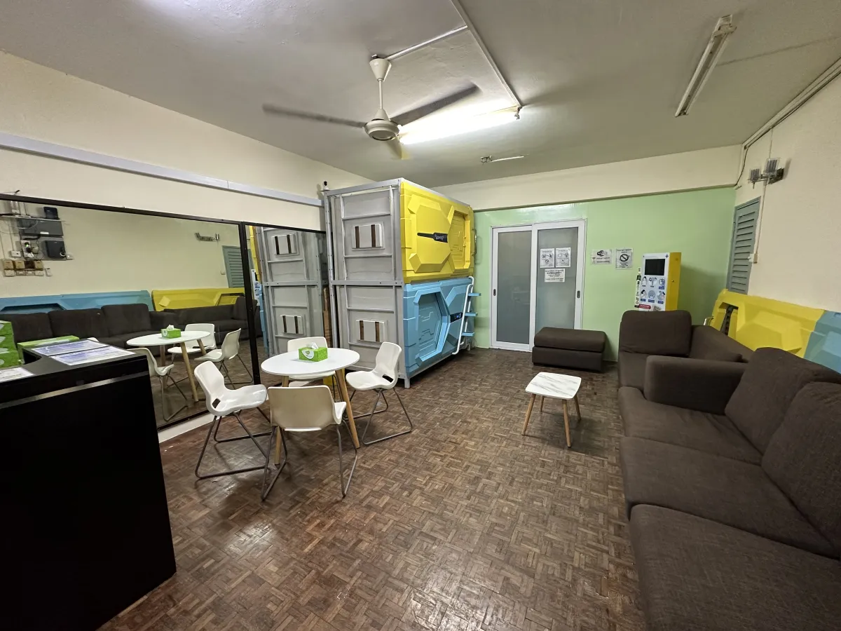 Shared common area and lounge space for guests to socialise at Pelangi Capsule Hostel